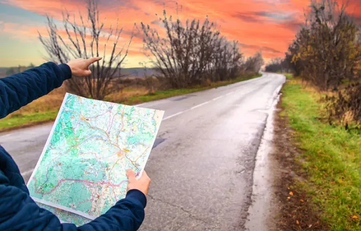 man looking at a map