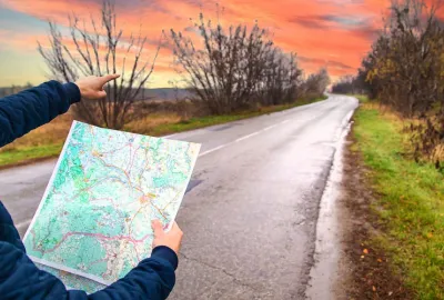 man looking at a map