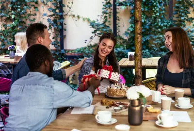 people sharing holiday season gifts