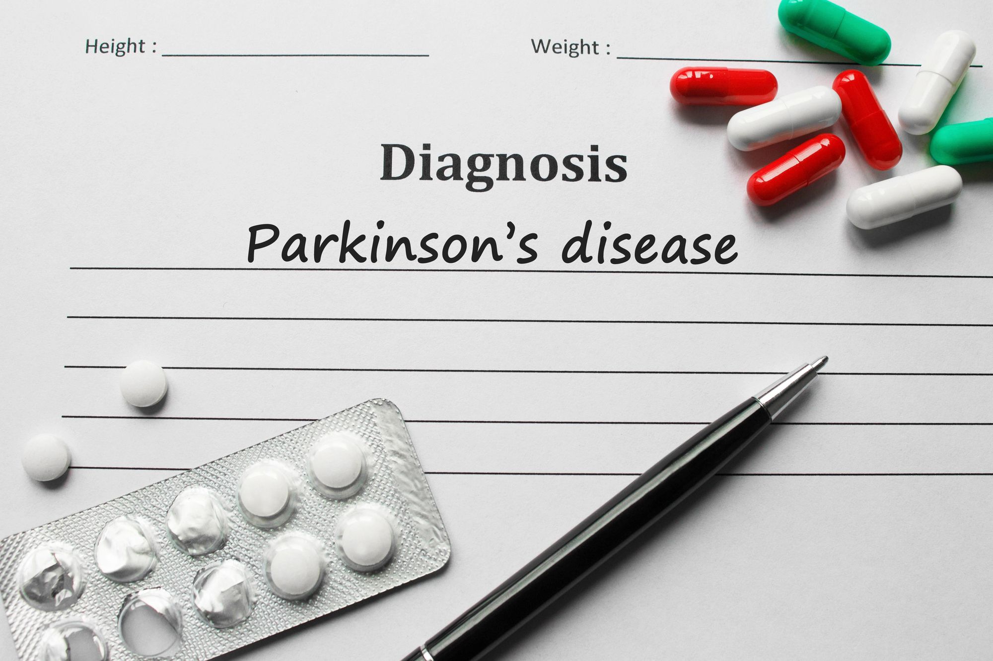 Image of paper containing the heading "diagnosis: Parkinson's disease"