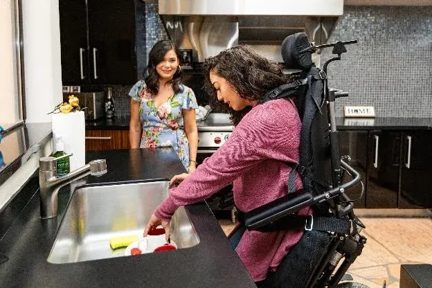 Woman in Power Chair Preparing a Meal
