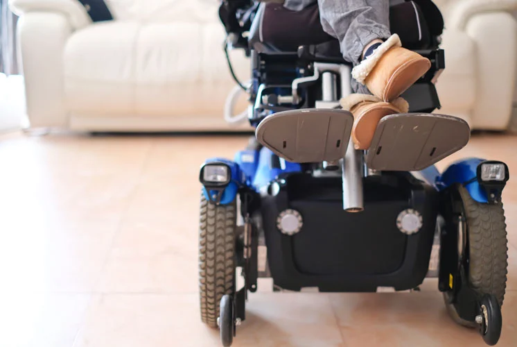 a person sitting on a wheelchair