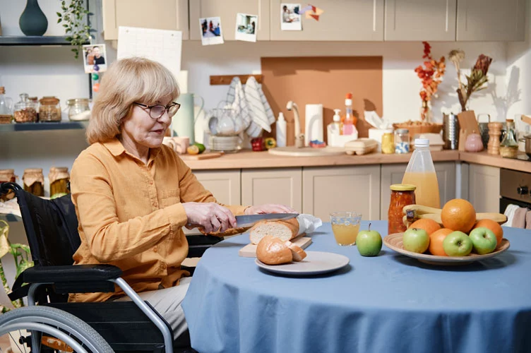 a senior woman cooking breakfast by herself 