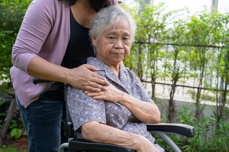 old woman on a wheelchair