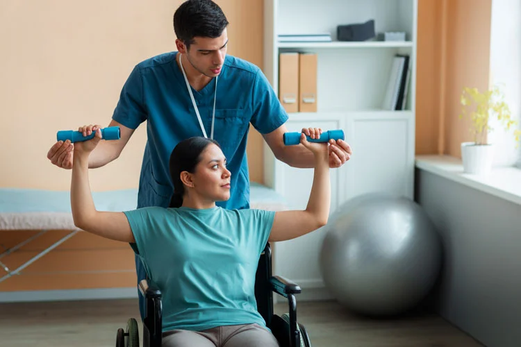 doctor helping patient on wheelchair