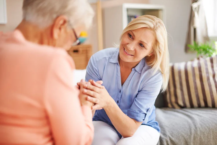 woman talking to an old person